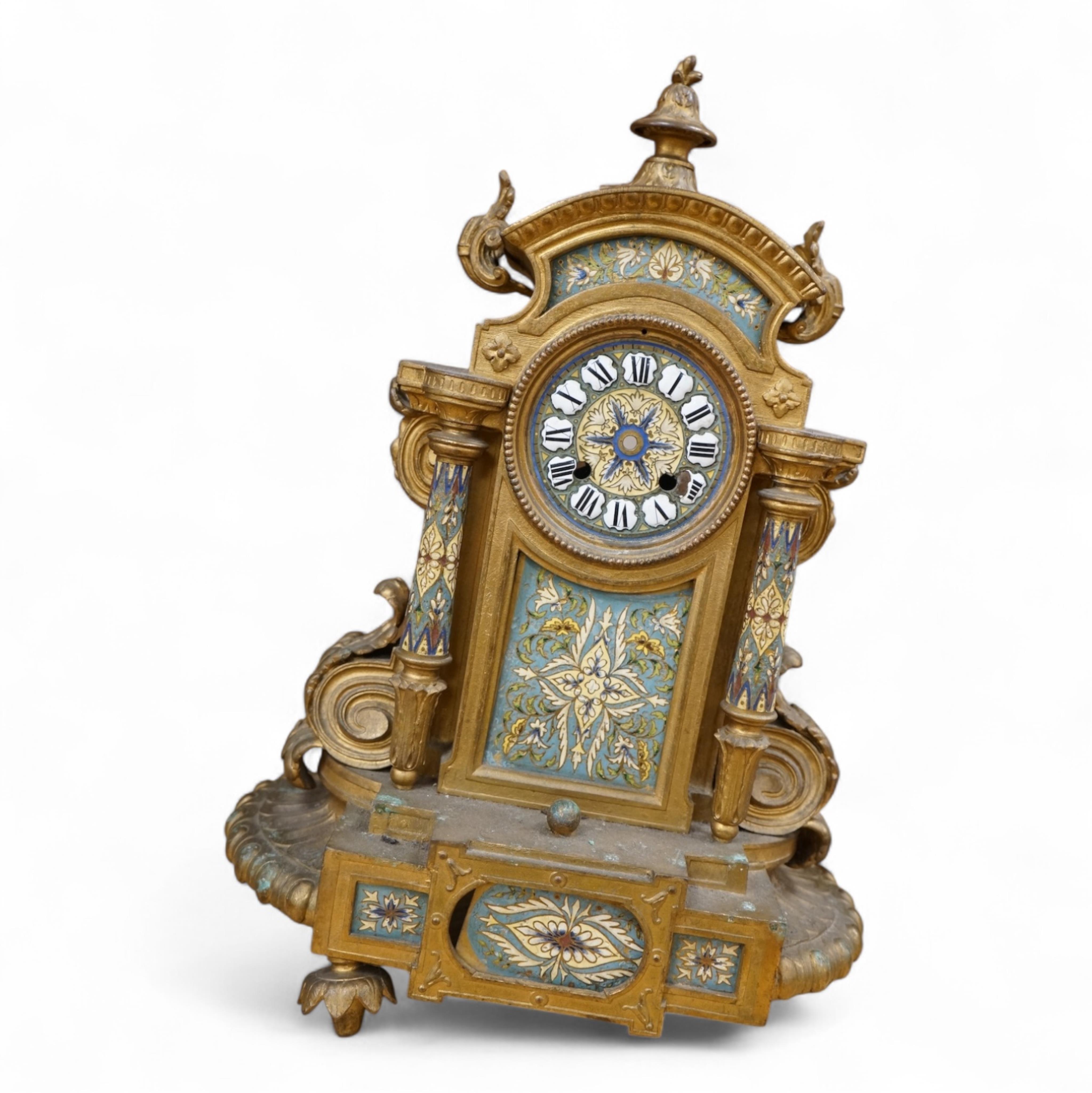 A French gilt metal and champleve enamel clock, 41cm